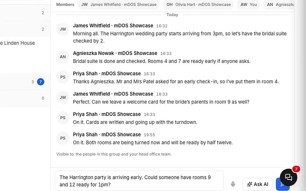 Screenshot: posting in the Front desk room and a colleague replying.